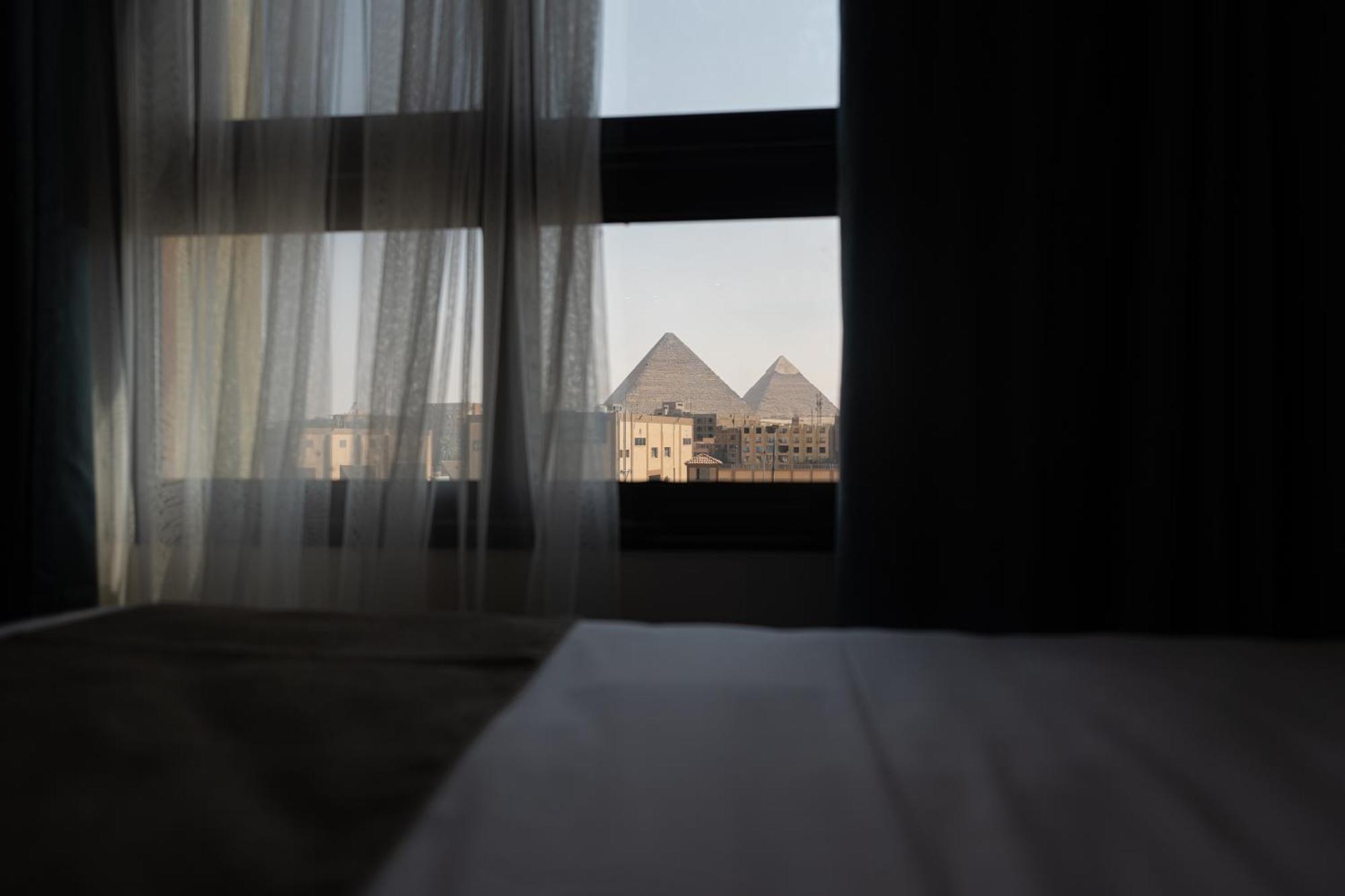 Al Kawm al Akhdar New Pyramid Front Hotel מראה חיצוני תמונה